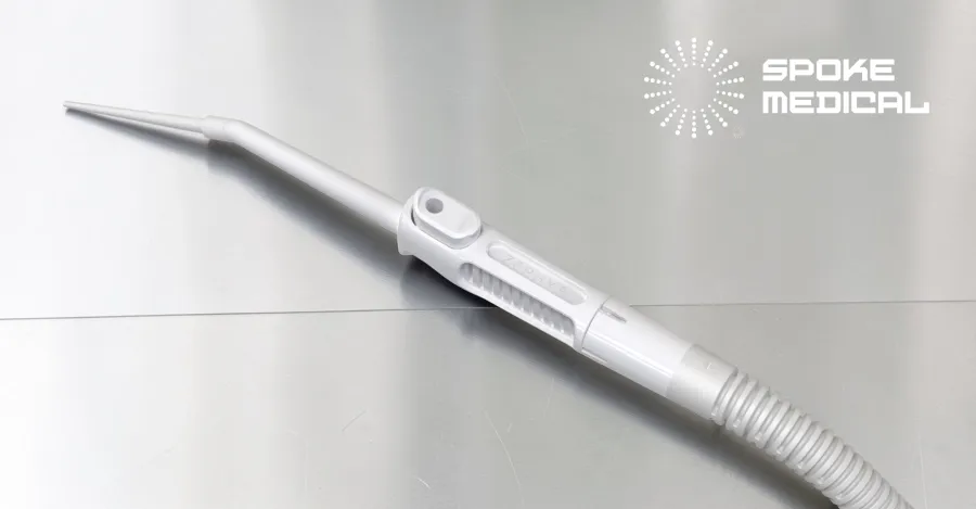 Zephyr microsuction device on a steel tray, thumb-port control and flexible tubing
