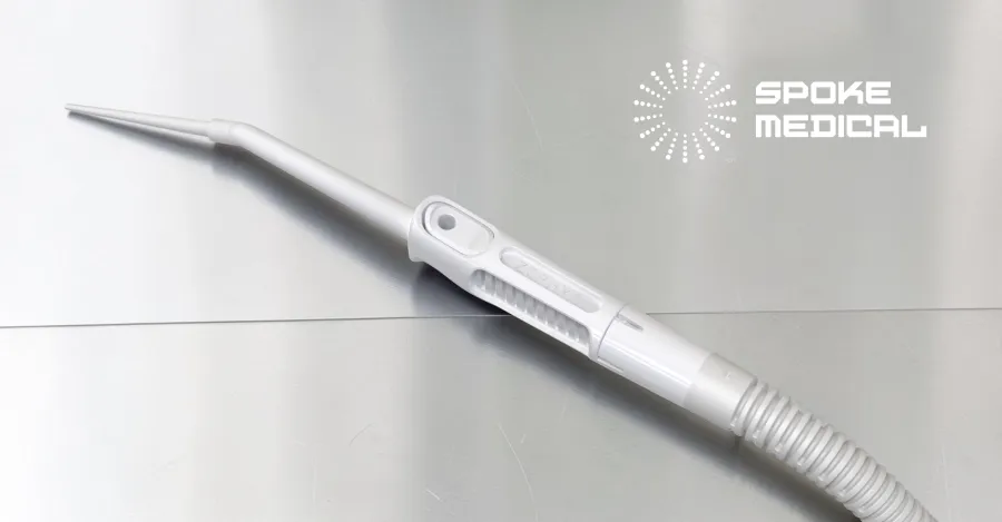 Zephyr handpiece on stainless steel, fine angled suction tip and ribbed grip window
