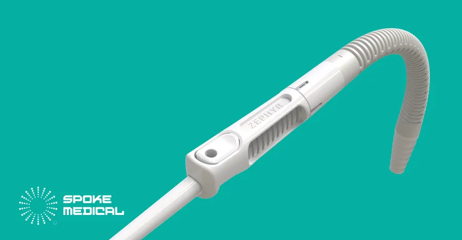 Zephyr microsuction handpiece at an angle, its flexible suction tubing curving away