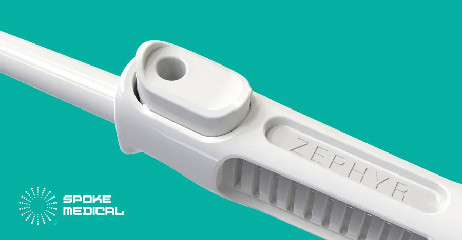 Close-up of the raised thumb-operated suction port above the Zephyr ribbed grip